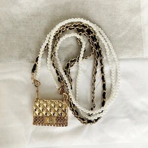 Metal mini crossbody bag featuring chain pearl necklace costume jewelry EUC